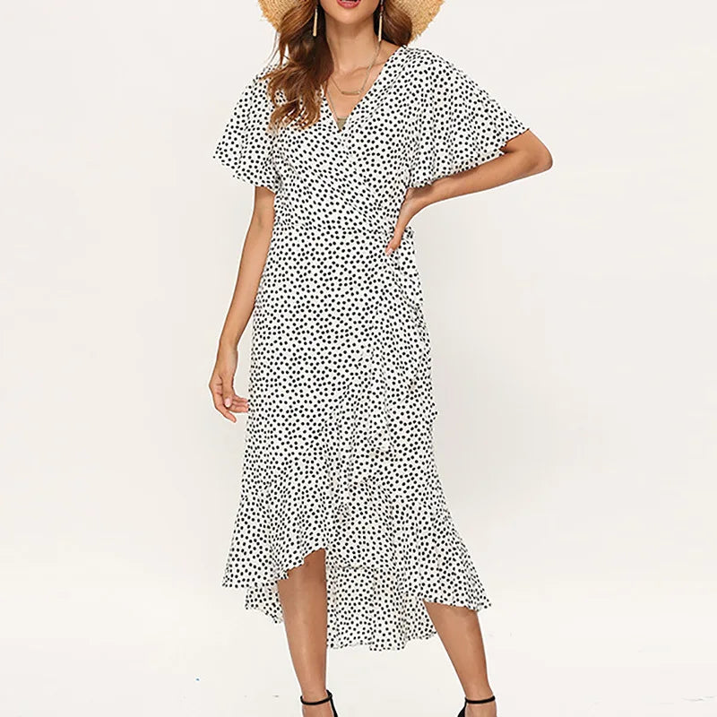 Effortlessly chic and perfect for warm-weather days, this Boho Floral Wrap Maxi Dress features a flattering V-neckline and flutter sleeves with stylish slits for a breezy, feminine touch.