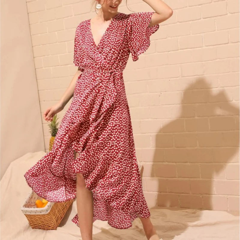 Effortlessly chic and perfect for warm-weather days, this Boho Floral Wrap Maxi Dress features a flattering V-neckline and flutter sleeves with stylish slits for a breezy, feminine touch.