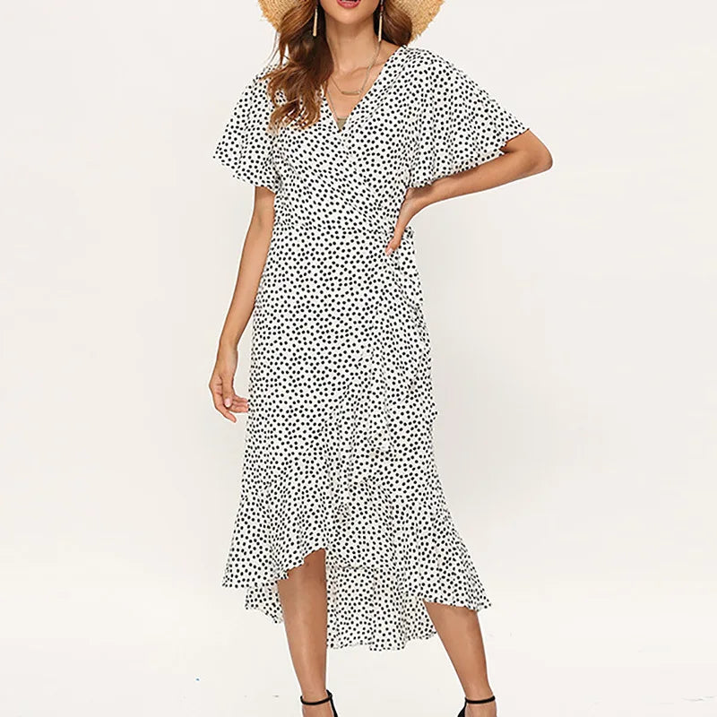 Effortlessly chic and perfect for warm-weather days, this Boho Floral Wrap Maxi Dress features a flattering V-neckline and flutter sleeves with stylish slits for a breezy, feminine touch.