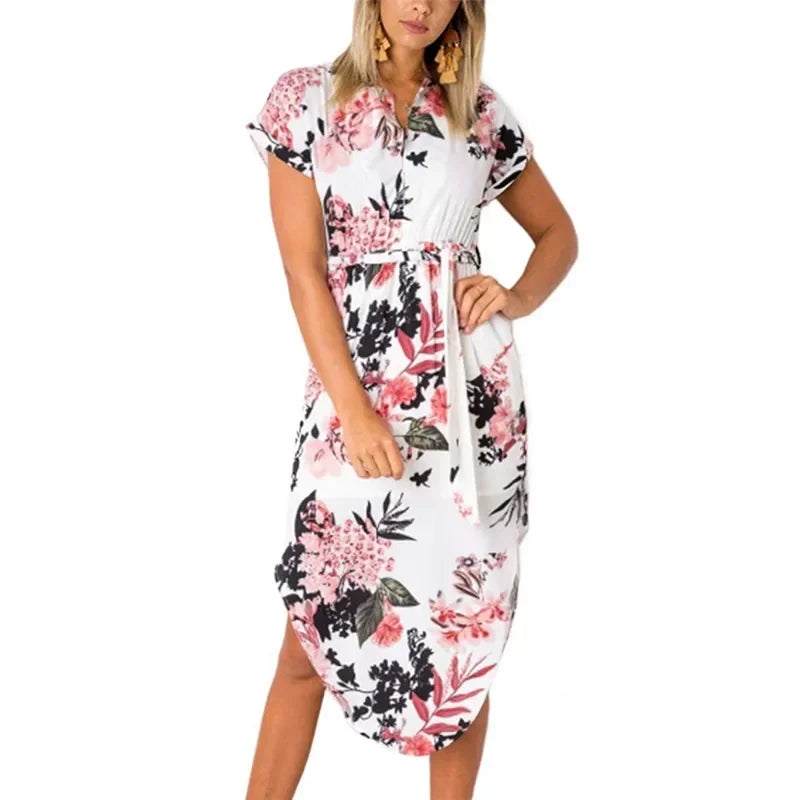 Step into effortless elegance with our Abstract Chic Belted Midi Dress