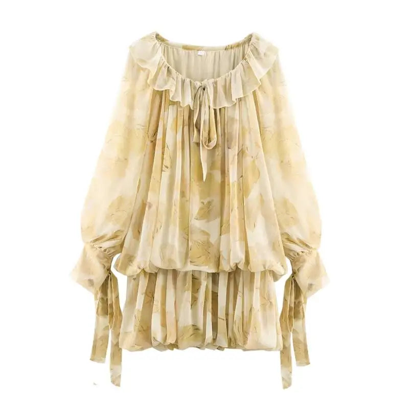 Boho-Chic Floral Pleated Two-Piece Set – Romantic Ruffle Blouse & Mini Skirt  Turn heads this season with our Boho-Chic Floral Pleated Two-Piece Set, a dreamy blend of elegance and carefree charm.