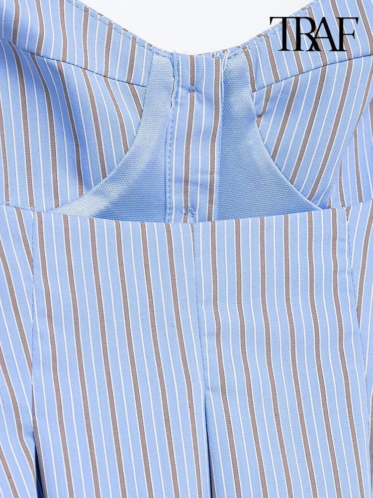 TRAF Striped Corset-Inspired Spaghetti Strap Top. Chic and contemporary striped top from TRAF. Featuring a flattering corset-inspired silhouette, this sleeveless blouse is crafted from a lightweight, breathable fabric perfect for warm weather.
