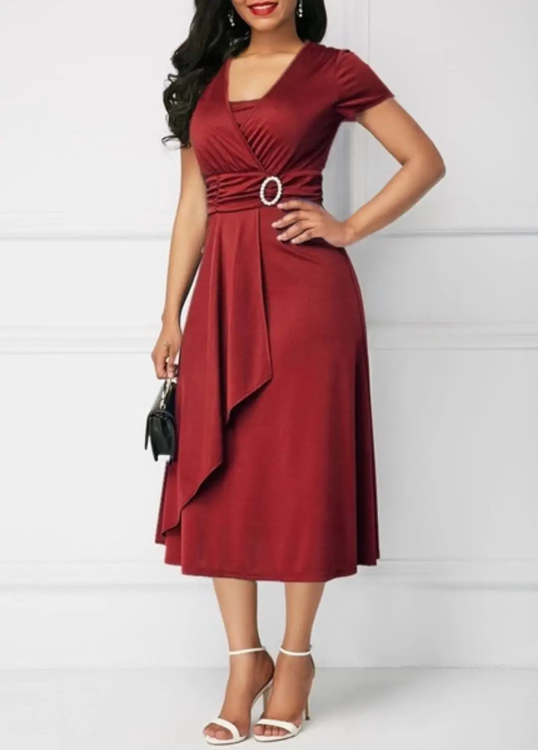 Elegant Midi Dress with Waist Detail and Front Draping  Chic and feminine, this elegant midi dress is perfect for weddings, formal events, or any special occasion.