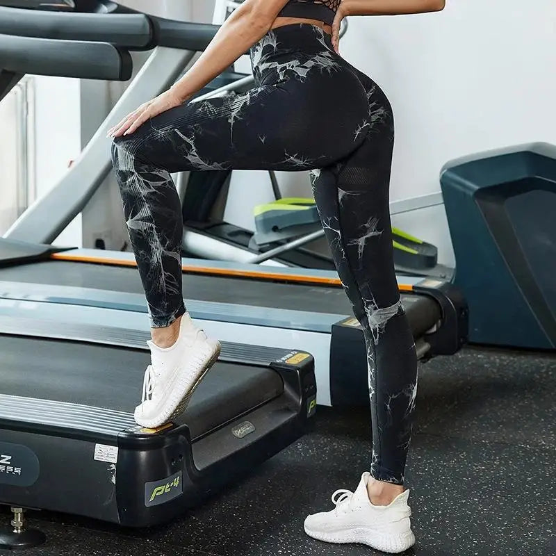 Tie-dye leggings, featuring a high-waisted fit. Stretchy, breathable fabric.