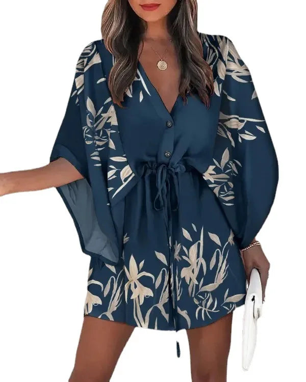 Stylish, tropical-inspired mini dress with a relaxed yet elegant vibe.