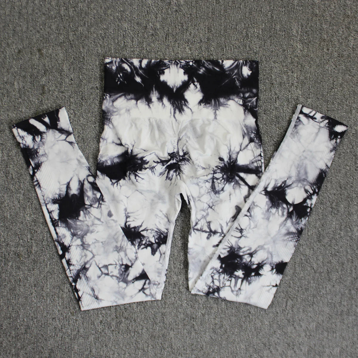 Tie-dye leggings, featuring a high-waisted fit. Stretchy, breathable fabric.