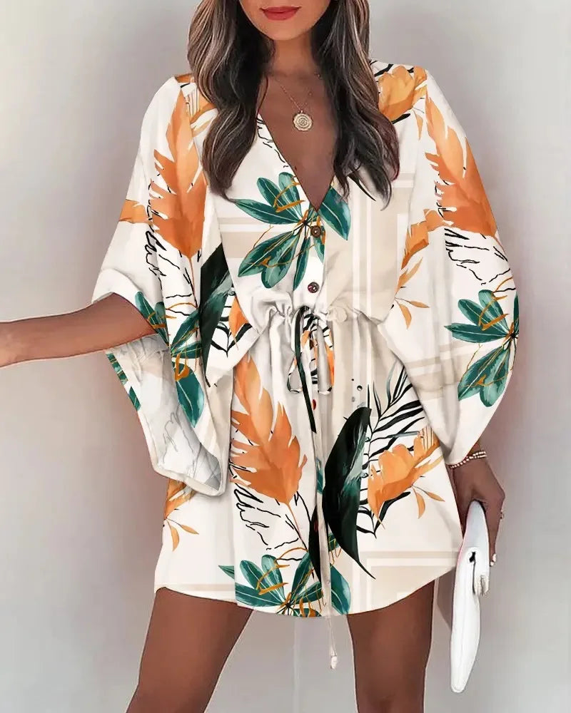 Stylish, tropical-inspired mini dress with a relaxed yet elegant vibe.