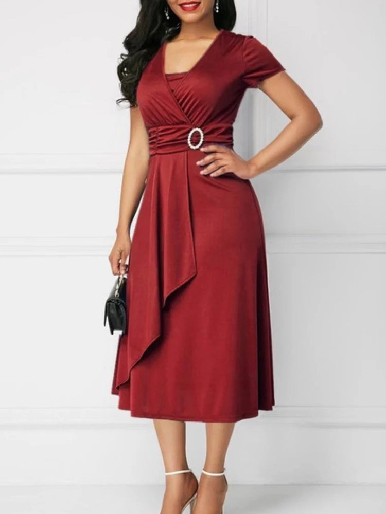Elegant Midi Dress with Waist Detail and Front Draping  Chic and feminine, this elegant midi dress is perfect for weddings, formal events, or any special occasion.