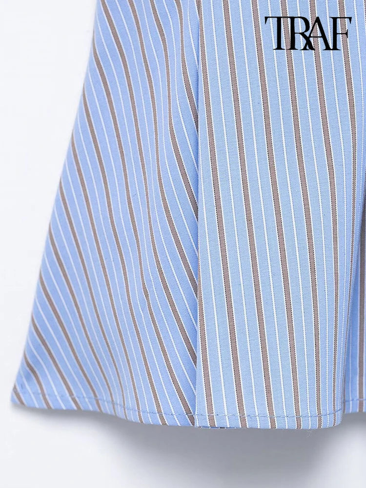 TRAF Striped Corset-Inspired Spaghetti Strap Top. Chic and contemporary striped top from TRAF. Featuring a flattering corset-inspired silhouette, this sleeveless blouse is crafted from a lightweight, breathable fabric perfect for warm weather.