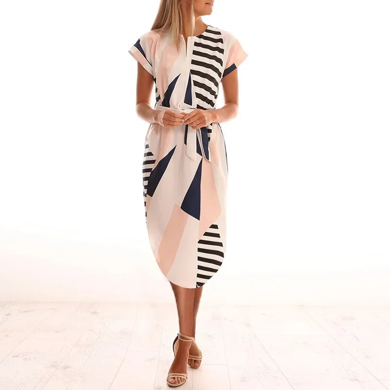 Step into effortless elegance with our Abstract Chic Belted Midi Dress
